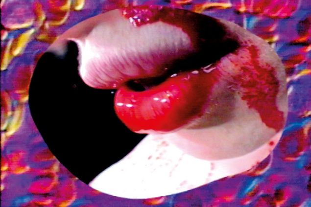 © Pipilotti Rist/VG BILD-KUNST Bonn Close-up of a mouth smeared with blood in an oval cut-out. The cut-out is outlined with purple shapes reminiscent of blood cells.